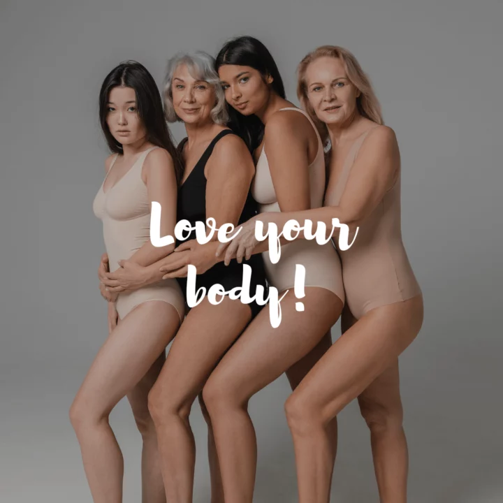 Ženy různého věku a vzhledu v prádle, s nápisem Love your body!, oslava rozmanitosti a přijetí těla.